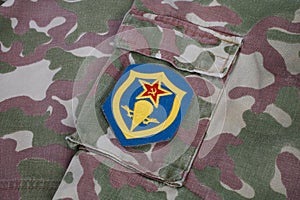 USSR military uniform - Soviet Army Airborne forces shoulder patch on camouflage uniform background