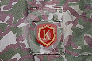 USSR military uniform - Soviet Army Commandant shoulder patch on camouflage uniform background photo