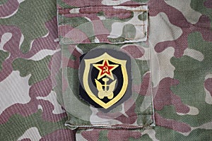 USSR military uniform - Soviet Army Transportation Corps shoulder patch on camouflage uniform background