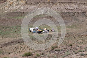 The Ustyurt Plateau. District of Boszhir. A group of tourists in cars stopped for the night. The bottom of a dry ocean Tethys.