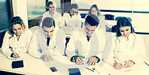 Interns at lecture at university