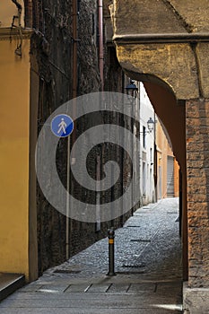 Usual pedestrian street with orange walls