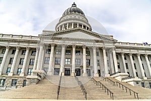 Utah State Capital building with stairs leading to the pedimented entrance