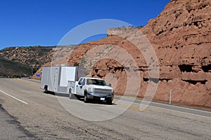 Utah: Truck towing enclosed trailer