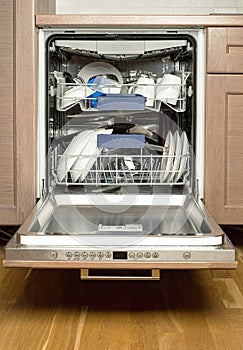 Utensils in dishwasher photo