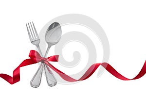 Utensils Fork Spoon with Red Ribbon isolated on white