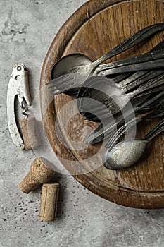 Rusty old utensils on grungy background