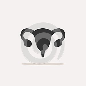 Uterus human icon with shadow on beige background