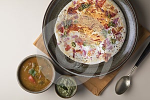 Uthappam or uttapam is a type of dosa photo