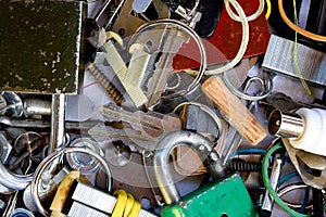 Utiliti room mess of things in storage, mixture of keys,pins,screws,etc. Old home mess