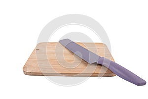 Utility knife and wooden board isolated on white background.