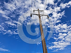 Utility Pole Against a Blue Sky