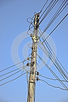 Utility pole against a clear blue sky