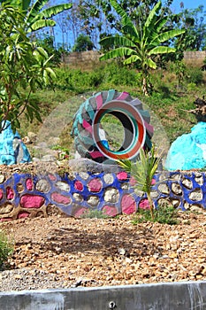 Utilizing used tires at tourist attractions by modifying paint colors