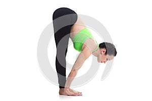 Uttanasana, intense forward bend yoga pose photo