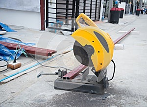 Utting steel rod by machine on a day at the