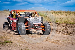 UTV buggy offroad vehicle racing on sand. Extreme, adrenalin. 4x4