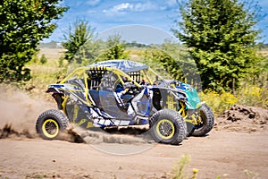 UTV kicking up sand on a dune. Extreme. 4x4