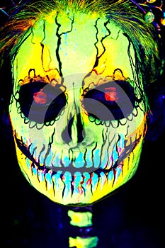 UV body art painting of helloween female skeleton