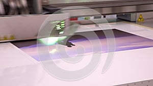 UV equipment. The printer prints the image. Services of polygraphy. Close up