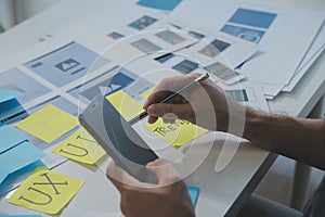 ux Graphic designer creative sketch planning application process development prototype wireframe for web mobile phone . User