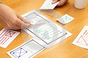 UX Graphic designer creative sketch and planning prototype wireframe for web mobile phone.