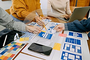 UX graphic designer planning application process development prototype wireframe for web smart phone. Creative digital development