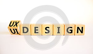 UX user experience design or UI user interface design symbol. Turned wooden cubes and changed words UX design to UI design.