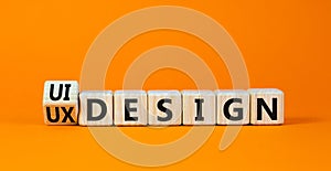 UX user experience design or UI user interface design symbol. Turned wooden cubes and changed words UX design to UI design.