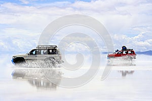 Uyuni Bolivia Driving on wet saltflats photo