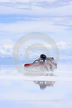 Uyuni Bolivia Driving on wet saltflats