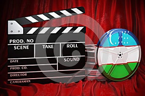 Uzbek cinematography, film industry, cinema in Uzbekistan. Clapperboard with and film reels on the red fabric, 3D rendering