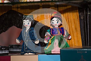 Uzbek kuls made of cloth stand on a shelf