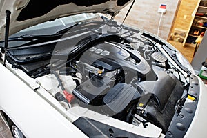 V6 engine of sport car in detailing garage photo