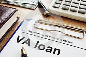 VA loan U.S. Department of Veterans Affairs form with clipboard.