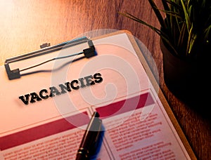 Vacancies Concept on Clipboard