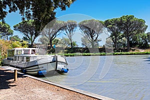 Vacation boat in Canal du Midi, family travel by barge, Southern France