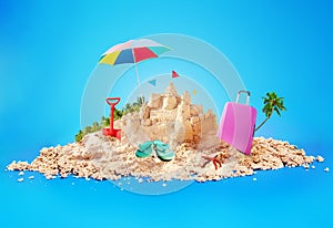 Vacation concept sand beach island and sandcastle