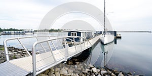 vacation homes and a sailing boat on the Grevelingenmeer in the netherlands