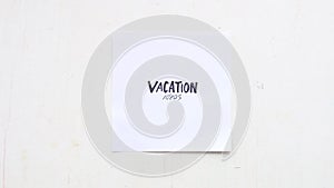 Vacation ideas text, inscription on paper