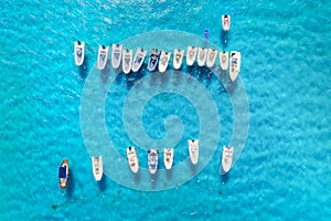 Vacation and leisure. Aerial view on fast boats on blue Mediterranean sea at sunny day. Fast ships on the sea surface.