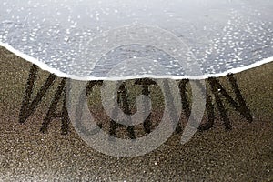 Vacation sand writing