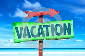 Vacation sign with beach background