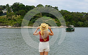 Vacation in South America. Back view of tourist girl in Vitoria, Espirito Santo, Brazil