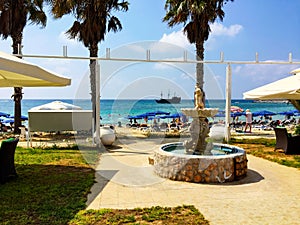 Vacation in tropical countries. Beach chairs, umbrella on the beach