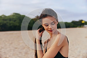 vacation woman sea beach summer ocean sand sunset smile nature lifestyle