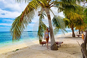 Vacationer woman at Maldives island beach