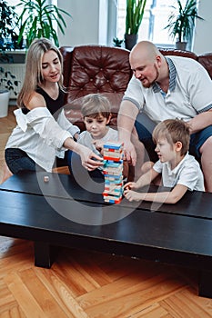 Vacations of happy family they relax at home together in apartment