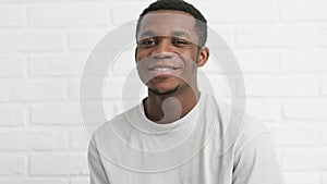 vaccinated African American man showing arm with medical plaster patch Plaster On Shoulder, black male after getting