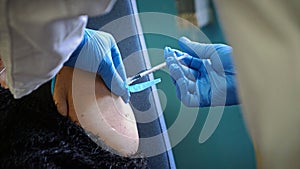 Vaccination Against Covid-19, a person receives the Pfizer`s coronavirus vaccin